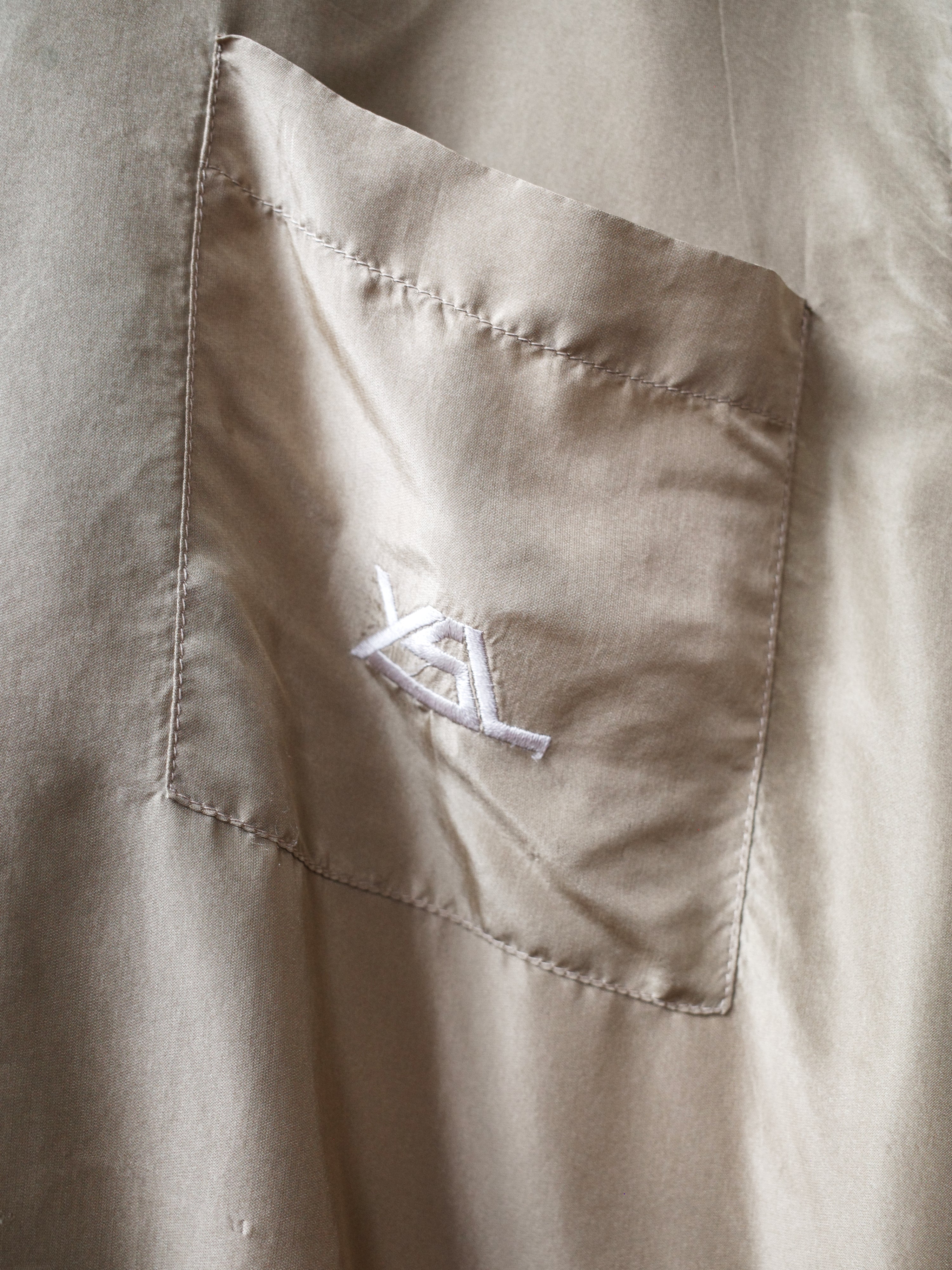 Yves Saint Laurent Deconstructed Gold Polo Shirt – METAL 金