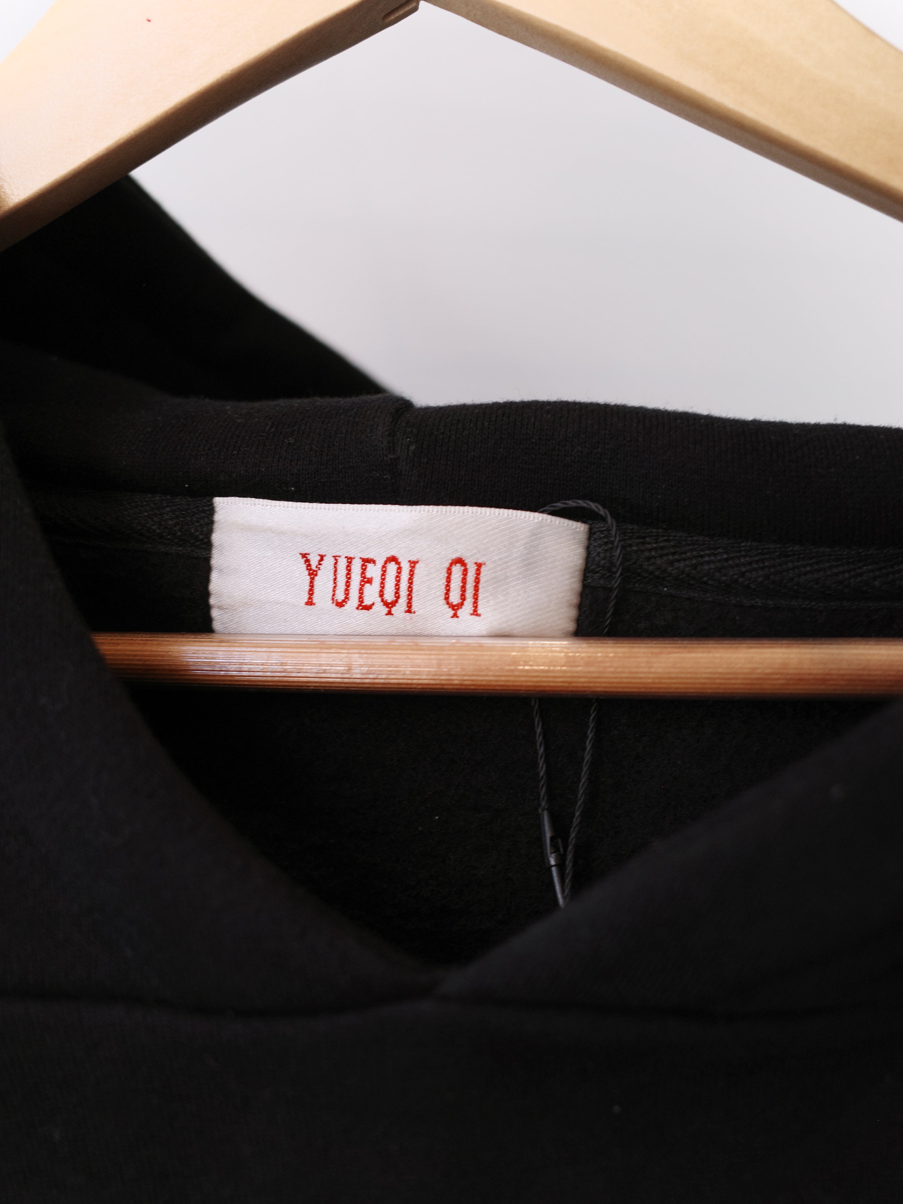 YUEQI QI Heart Cutout Hoodie with Blue Safety Pin Details – METAL 金